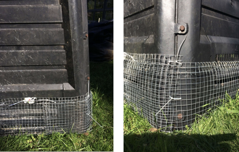 Kompostsilo mit Nagetierschutzgitter im Garten.